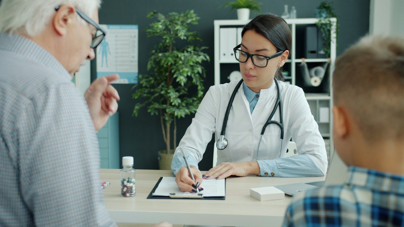Family healthcare conversation illustrating how to manage graduate school while caring for an aging parent